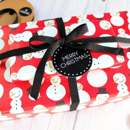 Snowmen on Red Wrapping Paper